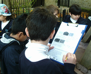 Year 3 pupils from Pimlico Primary carrying out a condition survey at St Saviour's First and Second World War memorial © War Memorials Trust, 2017
